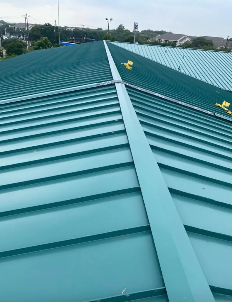 Green commercial metal roof ridge and valley for Metal Roof Repair in Fort Payne