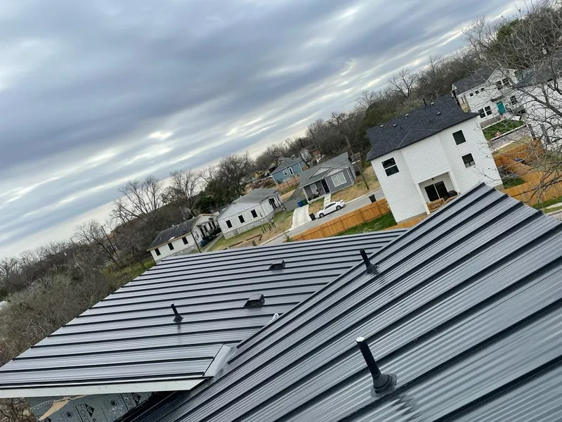 Standing seam metal roof panels with vents for Skylight Repair in Fort Payne